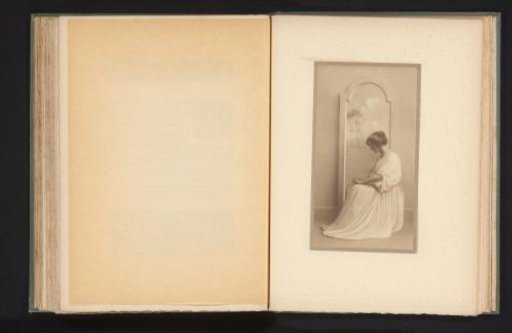 Woman seated before a painting