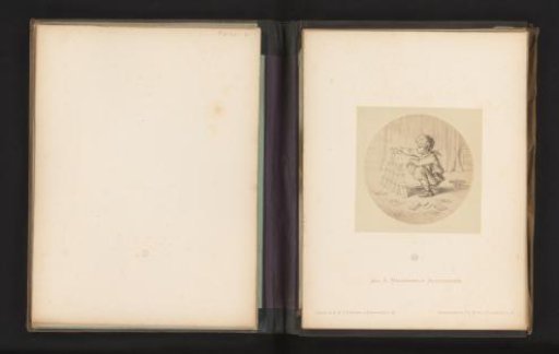 Photographic reproduction of a boy building a house of cards by Albert Hendschel
