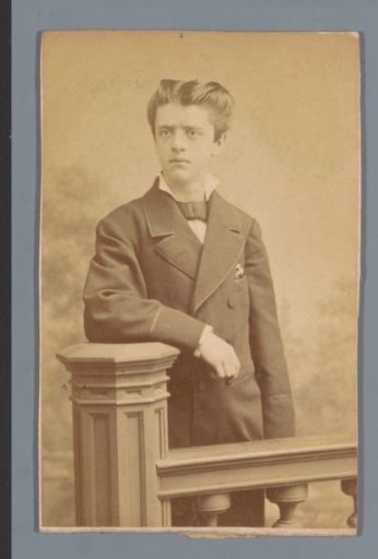 Portrait of an unknown man behind a balustrade