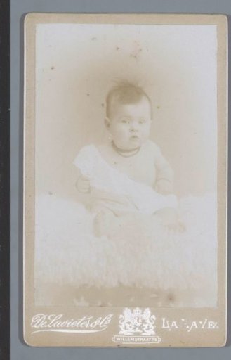 Portrait of an unknown baby on an animal skin