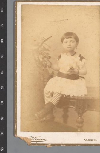 Portrait of an Unknown Girl, Sitting on a Table