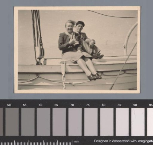 Portrait of an unknown woman and man on a boat