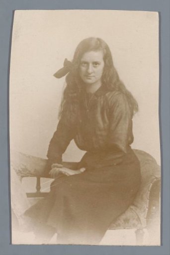 Portrait of an unknown woman with a bow in her hair