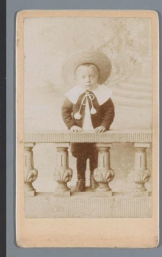 Portrait of an unknown boy wearing a hat