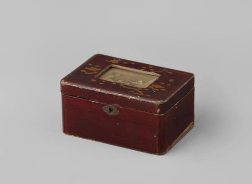 Red Japanese lacquer box with an albumen print on the lid