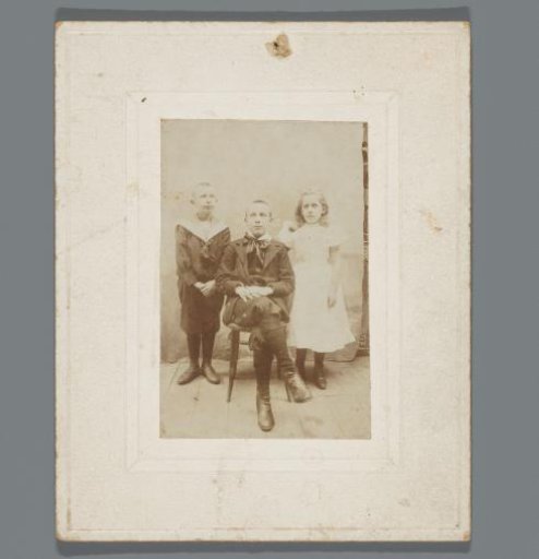 Group portrait of three unknown children