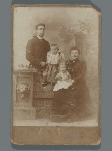 Group portrait of an unknown married couple with two children