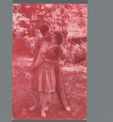Portrait of an unknown kissing couple with tennis rackets