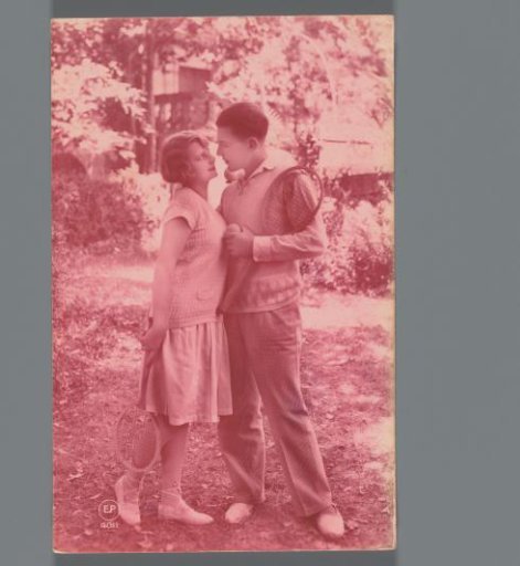 Portrait of an unknown loving couple with tennis rackets