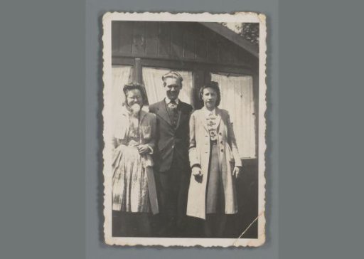 Group portrait of two unknown young women and a young man
