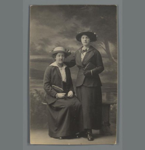 Portrait of two unknown young women in a photography studio