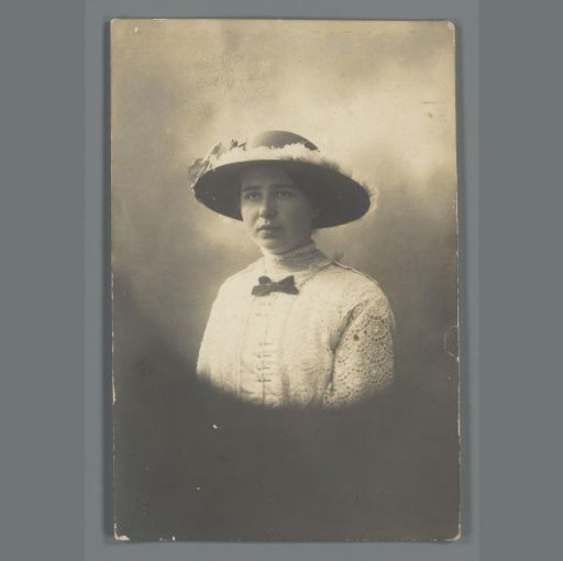 Portrait of an unknown young woman with a hat