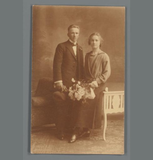 Portrait of an unknown young man and woman in a photography studio