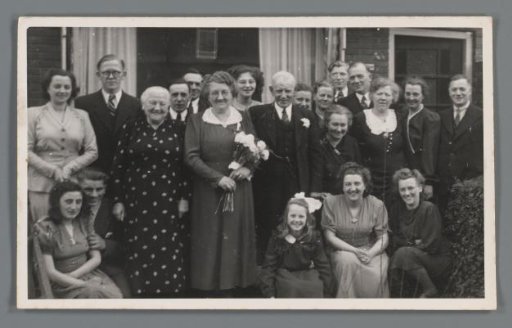 Group portrait of the Jorna family at a celebration
