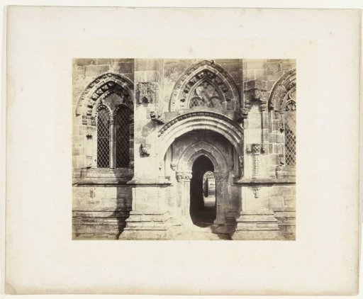 Side facade with portal of Rosslyn Chapel at Roslin, Scotland