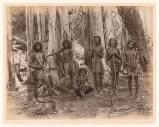 Group portrait of six unknown Vedda men in the forests of Sri Lanka