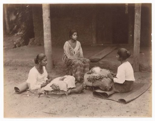 Three young women waving lace in Galle, Sri Lanka