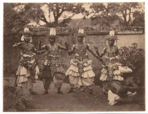 Group of Sinhala devil dancers, Sri Lanka