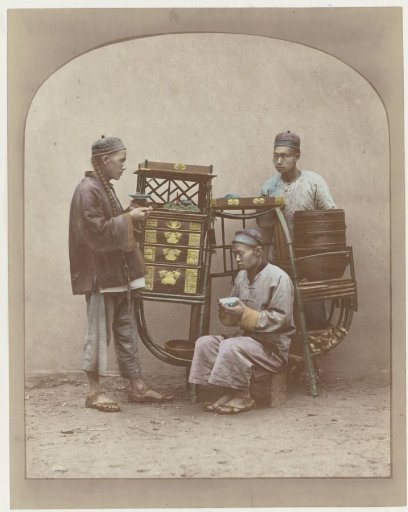 Three Chinese merchants by a cart