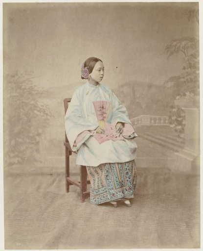 Portrait of a seated young Chinese woman