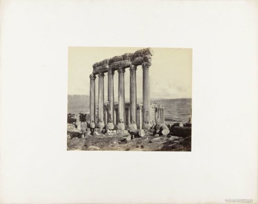 Columns of the Temple of Jupiter and the Temple of Bacchus in the background at Baalbek