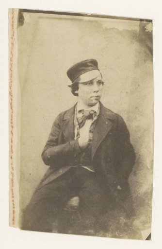 Portrait of an unknown young man with a cap