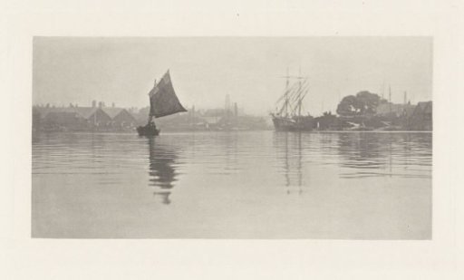 View of a city on the coast of Great Britain, with several ships in the foreground