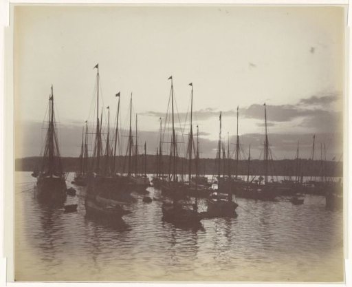Ships in a Harbour at Sunset