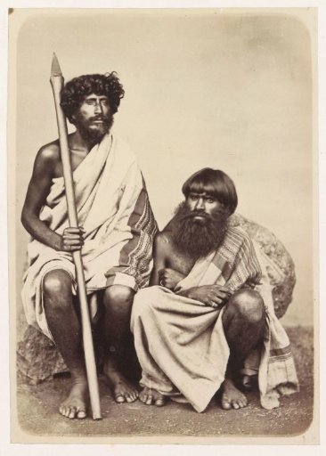 Studio portrait of two unknown Toda men from the Nilgiri hills, Tamil Nadu, India
