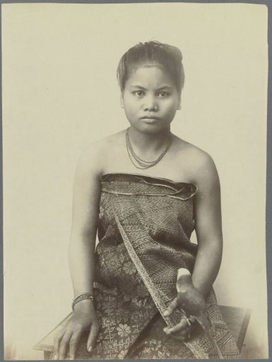 Portrait of an unknown young woman with a bird