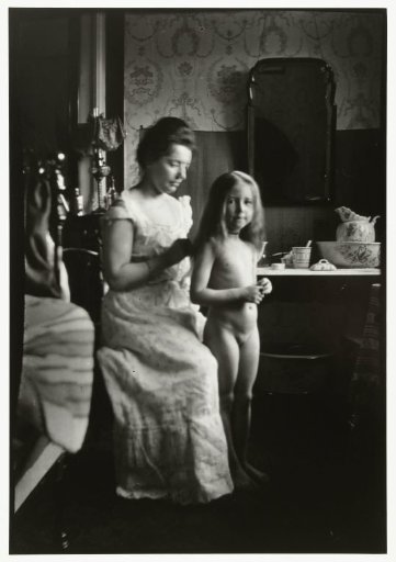 Portrait of Marie Breitner Helping a Girl Comb Her Hair