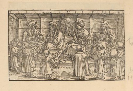 Four teachers on a bench with children in front of them