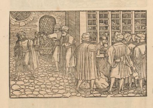 Prisoners being served food through bars