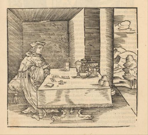 Man with cards and dice at a table