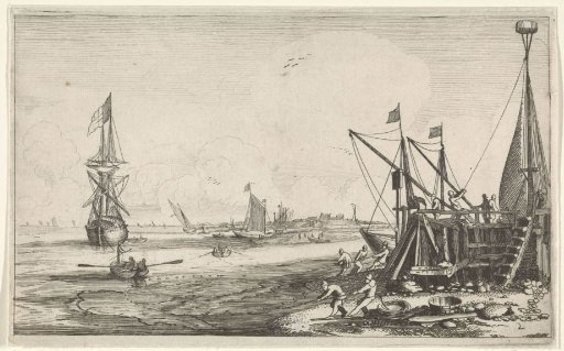 Harbour mole with fishermen hauling in their nets