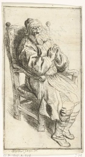 Old man seated in an armchair