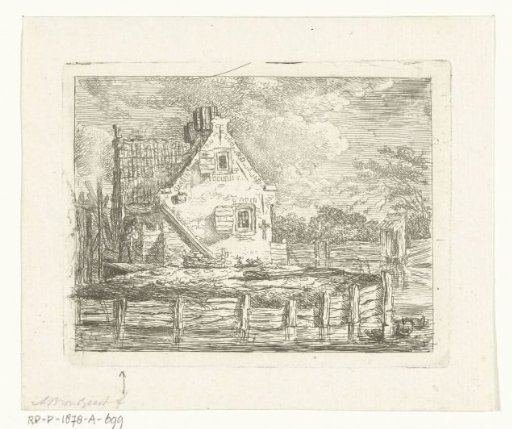 Stone house with yard surrounded by water