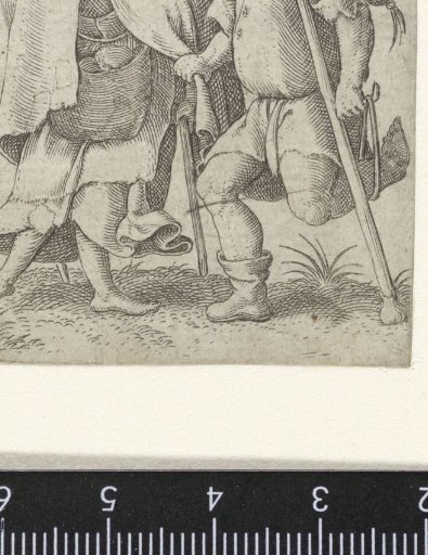 Dancing man and woman dressed as peasants