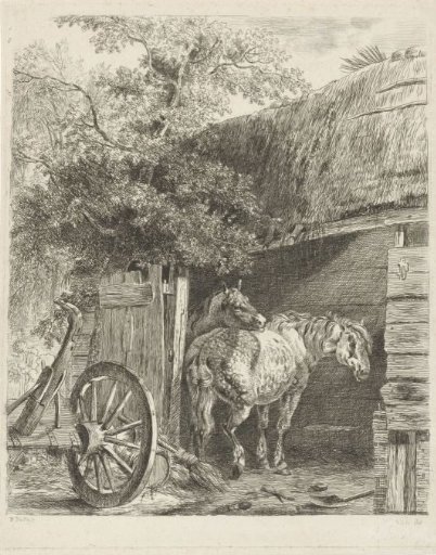Two horses in a barn