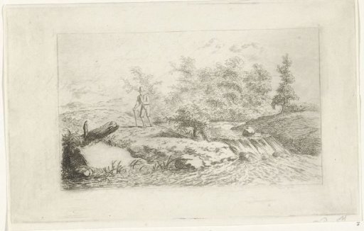 Man by a waterfall