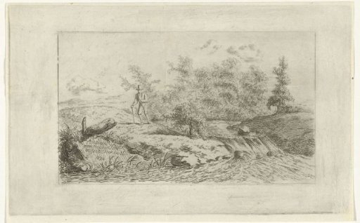 Man by a waterfall