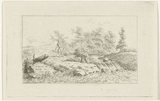 Man by a waterfall