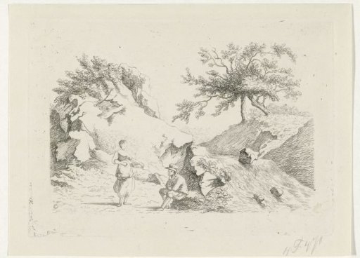 Man and woman by waterfall