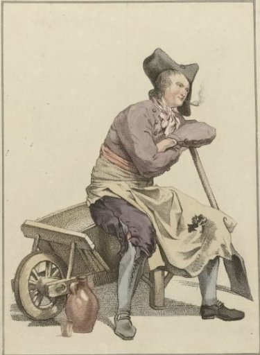 Man sitting on the edge of a wheelbarrow