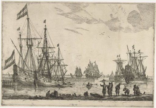 Four sailing ships behind a breakwater