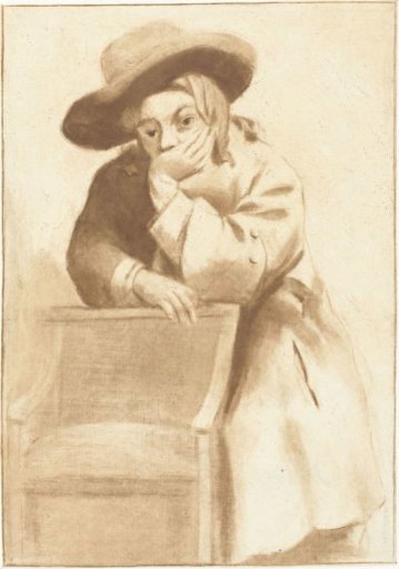 Boy leaning on a chair