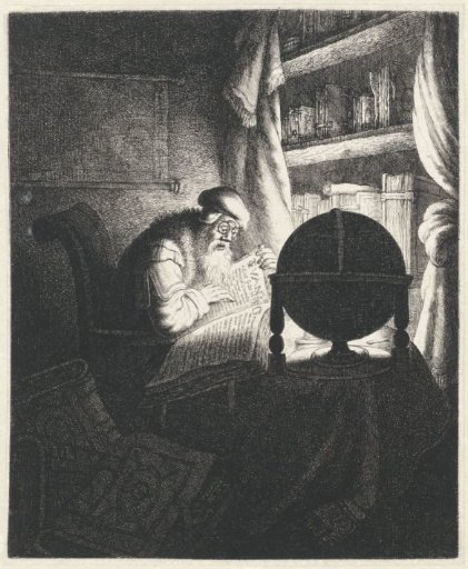 A man reading with spectacles in a study