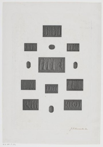 Nine rectangular carved stones and four oval stones