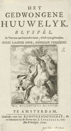 Young man climbing a rock