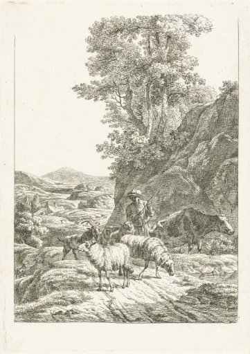 Shepherd with flock on mountain path